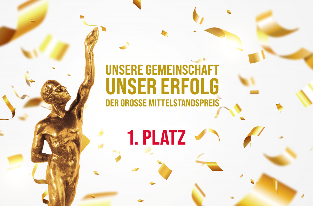 Goldene Statue mit Konfetti – 1. Platz beim Großen Mittelstandspreis.